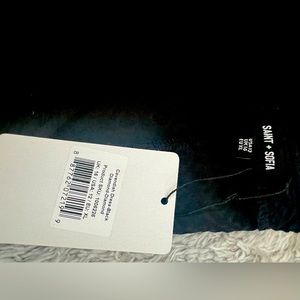 Womens Cute Black Dress with puffy sleeves. Never worn. With tags.